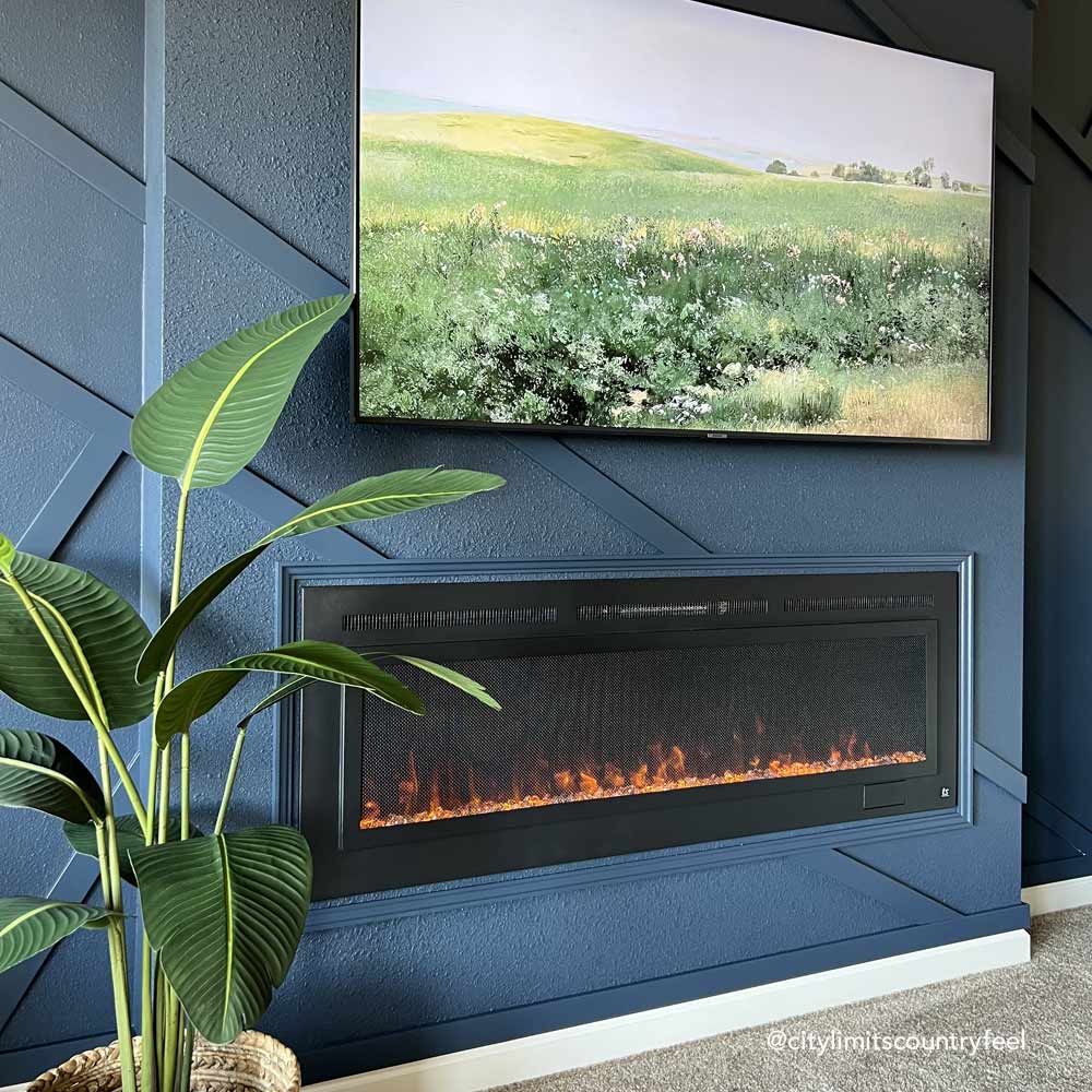 Touchstone Sideline Steel 60 inch Non reflective electric fireplace in board and battan feature wall by @citylimitscountryfeel