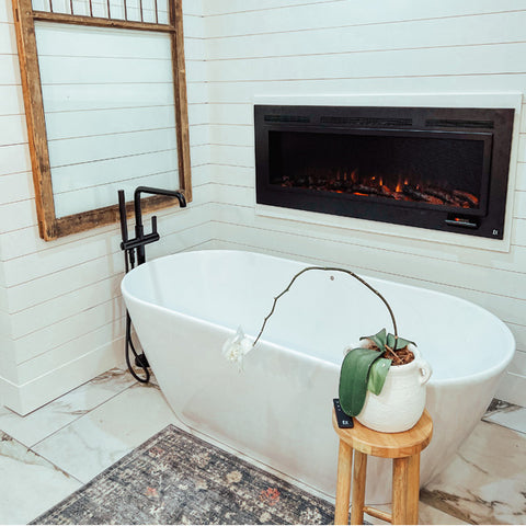 Touchstone Sideline Steel Electric Fireplace in bathroom by @fouts.farmhouse