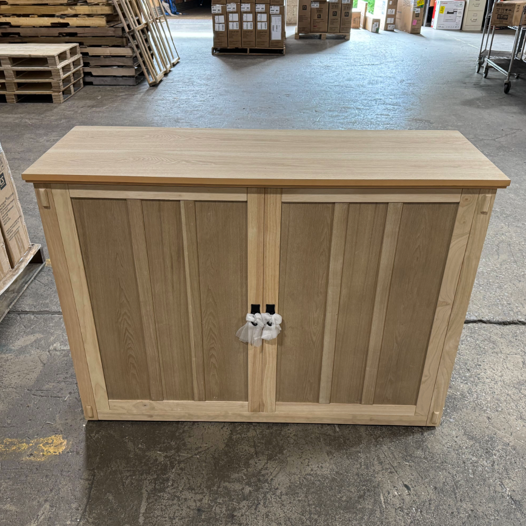 Touchstone Elevate Mission Smart TV Lift Cabinet in unfinished photographed in the warehouse - showroom unit.