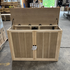 Touchstone Elevate Mission Smart TV Lift Cabinet in unfinished photographed in the warehouse - showroom unit.