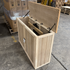 Touchstone Elevate Mission Smart TV Lift Cabinet in unfinished photographed in the warehouse - showroom unit.