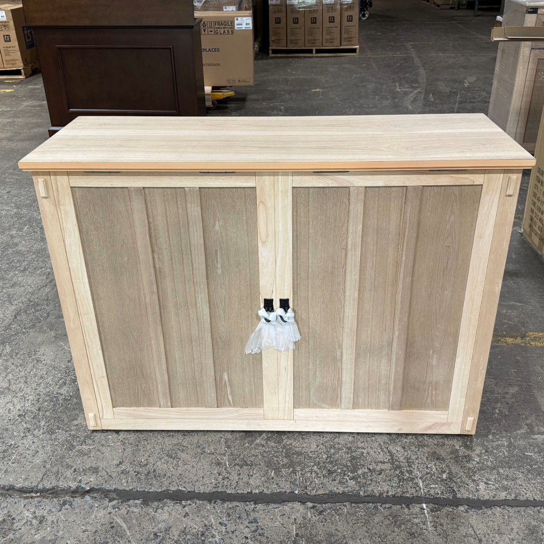 Touchstone Elevate Mission Smart TV Lift Cabinet in unfinished photographed in the warehouse - showroom unit.
