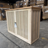 Touchstone Elevate Mission Smart TV Lift Cabinet in unfinished photographed in the warehouse - showroom unit.