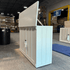 72013 Mission Elevate White showroom cabinet photographed in the warehouse.
