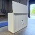 72013 Mission Elevate White showroom cabinet photographed in the warehouse.