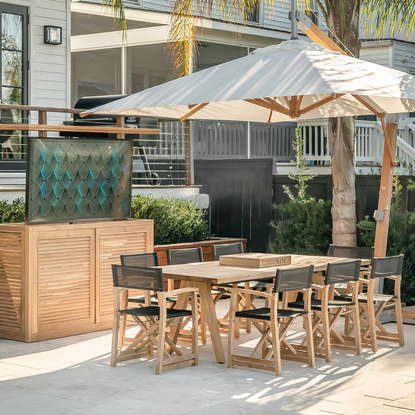 TechTeak 70066 Outdoor Swivel TV Lift Cabinet  pictured outside.
