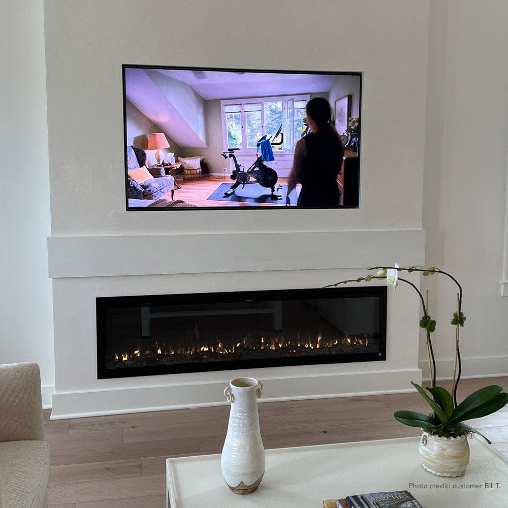 Touchstone Sideline Elite 72 Smart Electric Fireplace installed in white wall by customer Bill