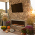 Touchstone Sideline Elite Outdoor Fireplace 80049 in outdoor fireplace wall on patio