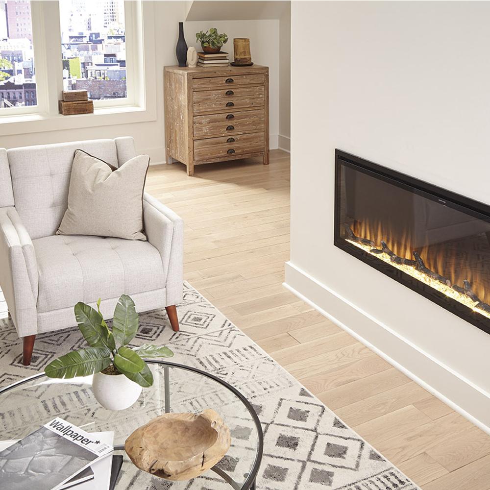 	Sideline Elite Smart 80042  WiFi-Enabled Recessed Electric Fireplace shown turned on in a living room.
